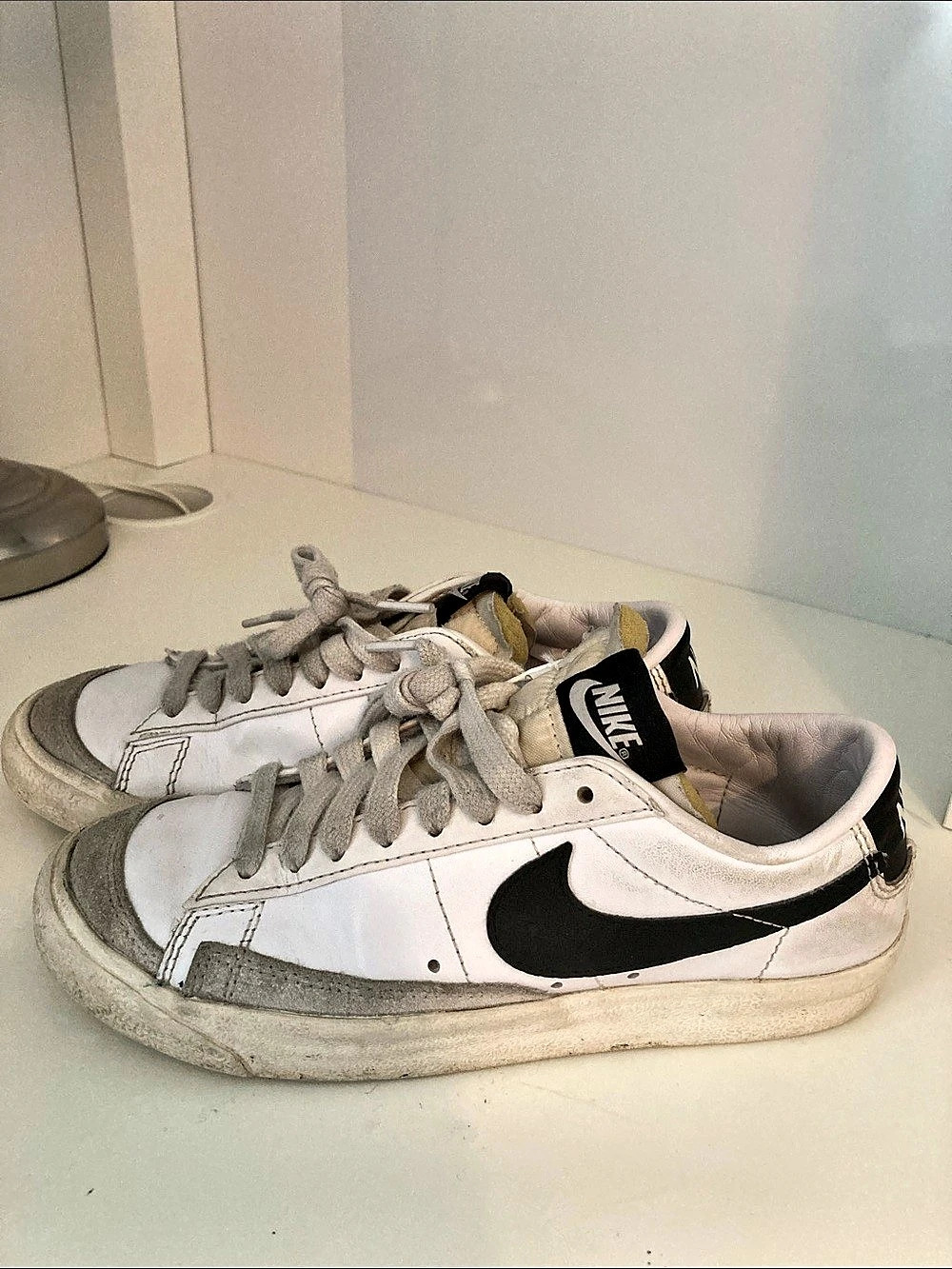 Nike Blazer Low '77 Vintage White Black Sneakers in White & Black